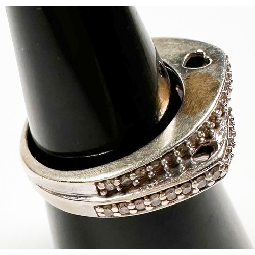 225 - A 9ct white gold dress ring, off set with two rows of diamonds, estimated total diamond weight 0.60c... 