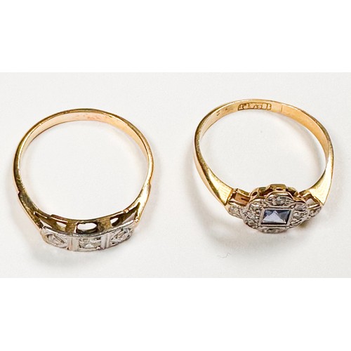 240 - An 18ct yellow gold and platinum dress ring, set with a square-shaped blue stone to the centre, surr... 