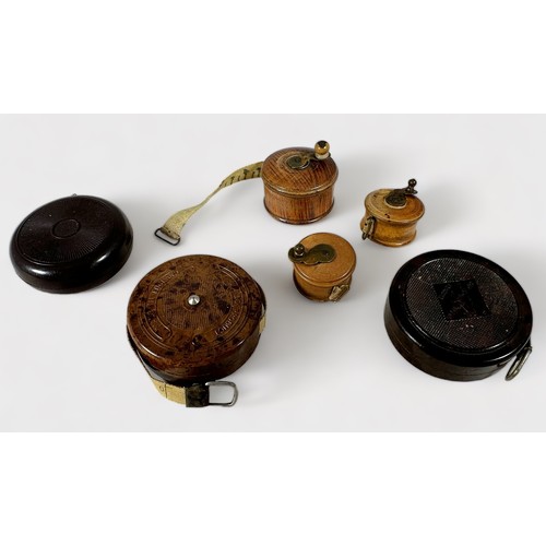 359 - Thirty-Eight Various habidashery miniature tape measures including three Treen fishing reels, Jay Br... 