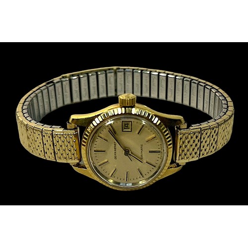 185 - A ladies 18ct gold cased Jean Renet ‘Daymatic’ automatic wristwatch, the champagne dial with applied... 