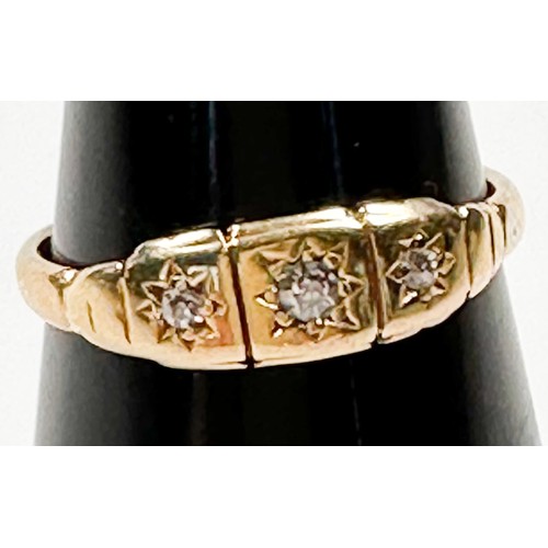 193G - An 18ct yellow gold dress ring, star set with three Victorian cut diamonds in a square grooved top, ... 