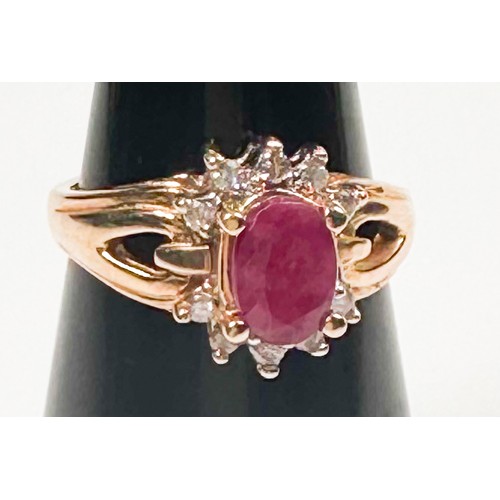 238 - A 14ct yellow gold dress ring, four-claw set with an oval shaped ruby to the centre, measuring 7mm x... 