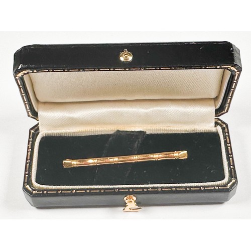250 - An 18ct yellow gold bamboo design bar brooch, weighs 2.3 grams.