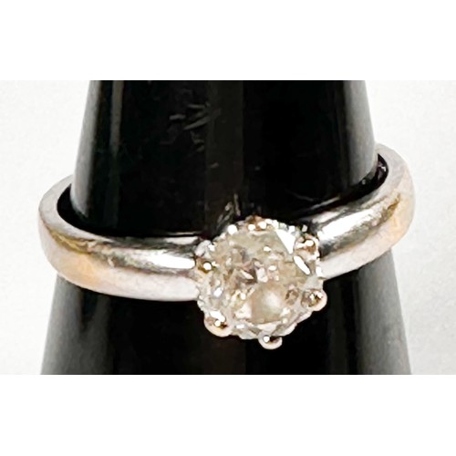 255 - An 18ct white gold solitaire diamond ring, six claw set with a round diamond, estimated K colour, P3... 