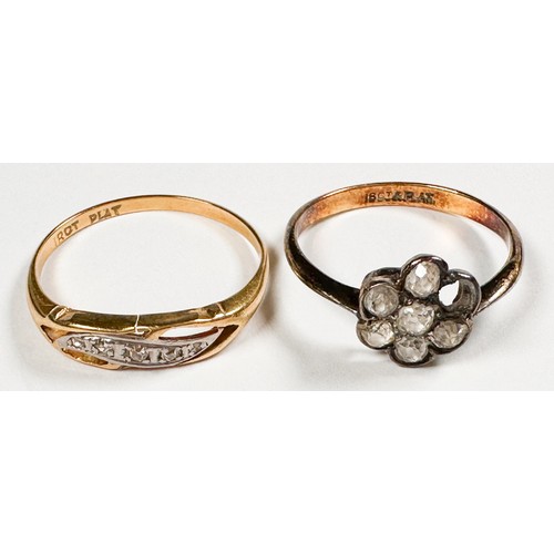 256 - An 18ct gold and platinum ring, set with old-cut diamonds in a daisy cluster design, (one diamond mi... 