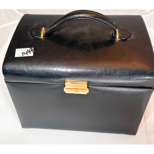 261 - A black leather jewellery case with various items of costume and silver jewellery, including a pair ... 