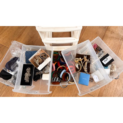 247 - An assortment of costume and silver jewellery in a large plastic 5-drawer storage unit, including co... 