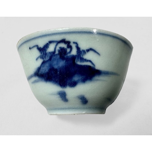 93 - Nanking Cargo 18th Century blue and white Chinese tea bowl and saucer, 1752, decorated with a pagoda... 
