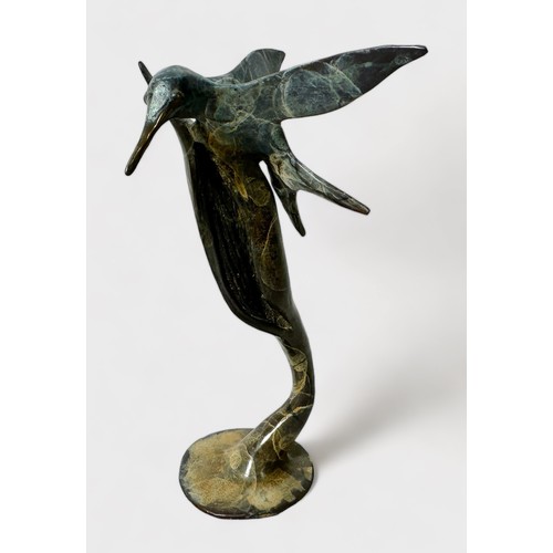 662 - After Michael Storey (b1948), A cast and patinated bronze study of a Hummingbird on a flower stem, 1... 