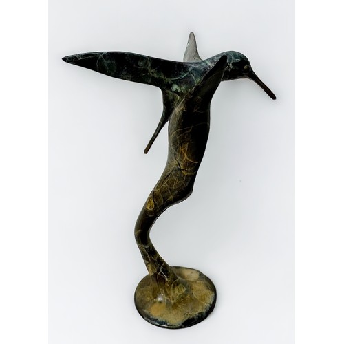 662 - After Michael Storey (b1948), A cast and patinated bronze study of a Hummingbird on a flower stem, 1... 