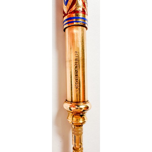 264 - A gold and enamelled propelling pencil by Sampson Mordan & Co. The outer sleeve blue, red and white ... 