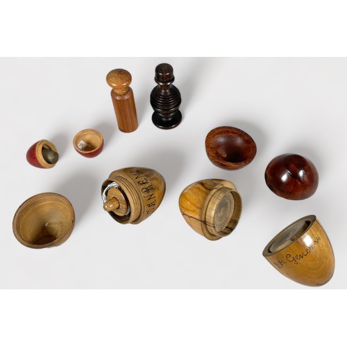 358 - A collection of twenty-three Treen sewing accessories including egg-shaped etuis, thimble and bobbin... 