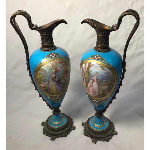 75 - A fine pair of early 19th century bronze-mounted Sevres 'Style' porcelain ewers, the ovoid bodies wi... 