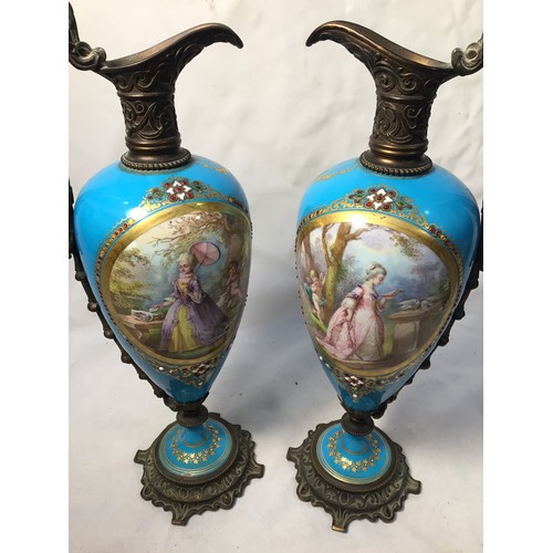 75 - A fine pair of early 19th century bronze-mounted Sevres 'Style' porcelain ewers, the ovoid bodies wi... 