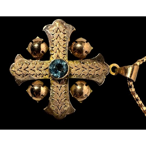 268 - A yellow metal, tests as 14ct gold, Jerusalem cross pendant, centrally bezel set with a topaz colour... 