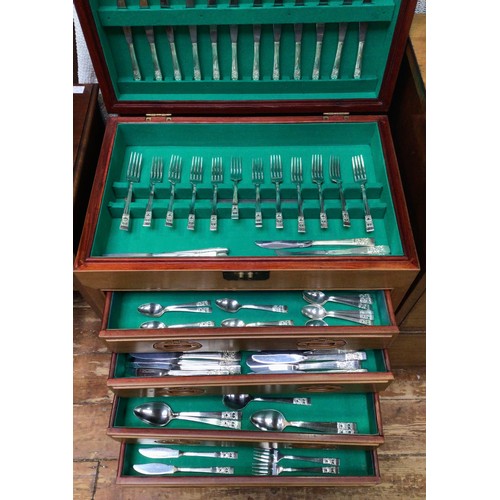 150 - A 20th Century Oriental hardwood canteen cabinet, housing silver-plated cutlery for twelve persons b... 