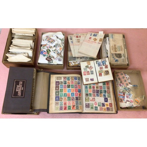 338 - A collection of assorted GB and world stamps, comprising, mostly used on paper, loose unused, quanti... 