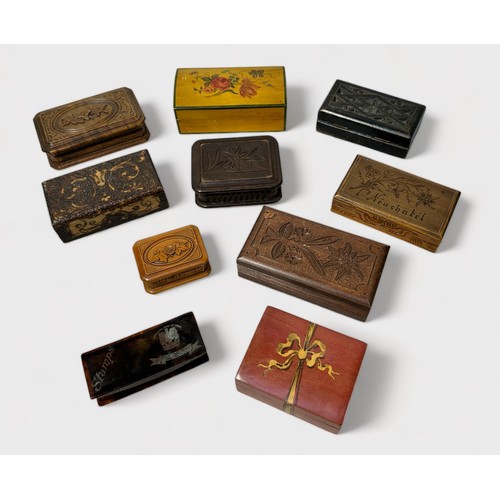 424 - Seventeen various postage stamp boxes including carved and painted and metal-mounted examples,