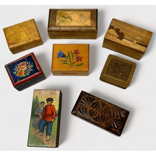 423 - Twenty-six various postage stamp boxes including carved and painted eamples and a patinated metal st... 