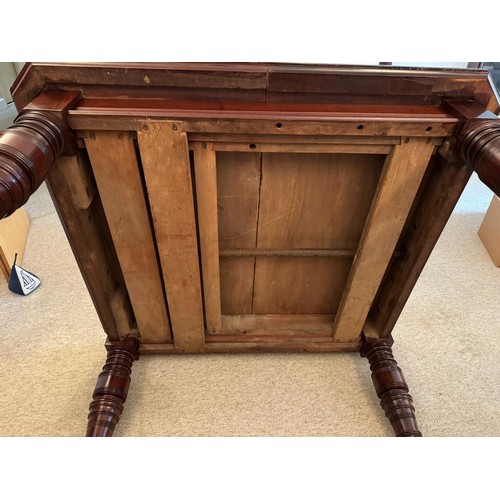 706 - A large Victorian mahogany dining table, two leaves, canted corners, raised on four turned supports ... 