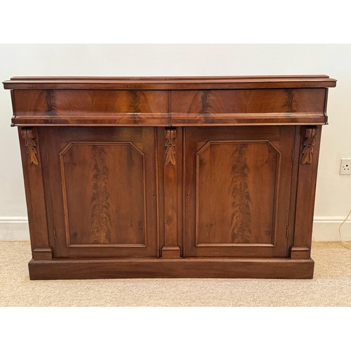 708 - A 19th century mahogany chiffonieire, with two concave frieze drawers abve a pair of cupboard doors ... 