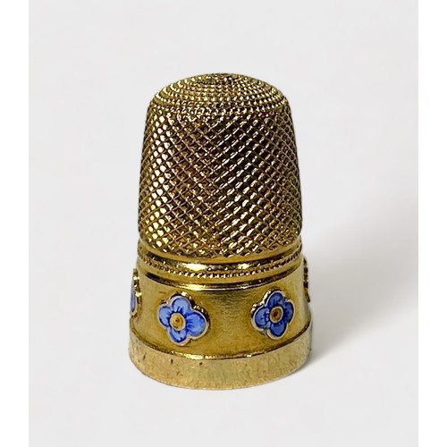 408 - An unmarked gold thimble, testing higher than 15ct, dimpled crown and diamond dimpled skirt, the fri... 