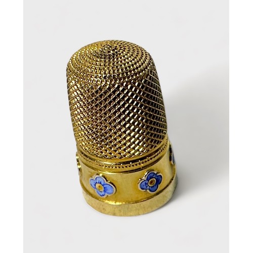 408 - An unmarked gold thimble, testing higher than 15ct, dimpled crown and diamond dimpled skirt, the fri... 