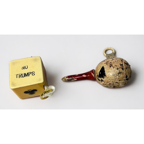 353 - Two Novelty Tape Measures, a celluloid Trumps Dice and a Wooden Maraca, (2)