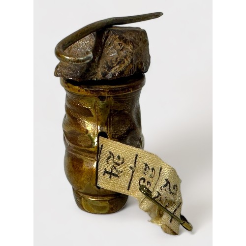 348 - A Novelty Gilt Brass Tape Measure modelled as a Hobnail Boot with a rock and walking stick balanced ... 