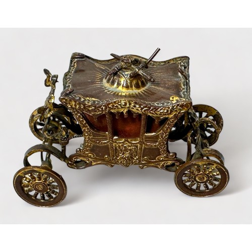 346 - A Novelty Tape Measure modelled as the Royal State Coronation Coach, gilt-brass and metal (gilding w... 