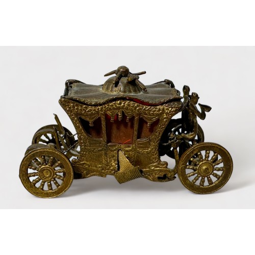 347 - A Novelty Tape Measure modelled as the Royal State Coronation Coach, gilt-brass and metal (gilding w... 