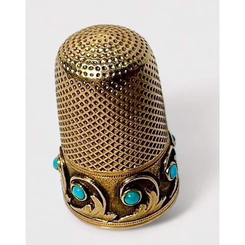 397 - A 19th century unmarked gold thimble, of typical diseign with dimpled crown and skirt, the lower fri... 