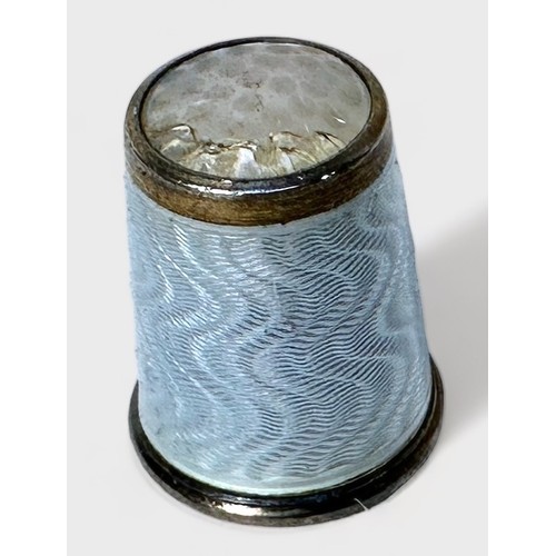 344 - A Norwegian silver and pale blue guilloche enamel thimble with moonstone apex, by David Andersen, ma... 