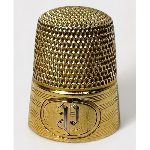 342 - An American 14K Gold Thimble, milled with a band of horizontal reeding, cartouche engraved with lett... 