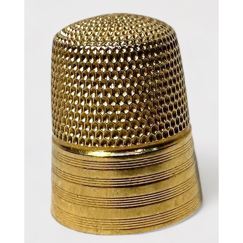 342 - An American 14K Gold Thimble, milled with a band of horizontal reeding, cartouche engraved with lett... 