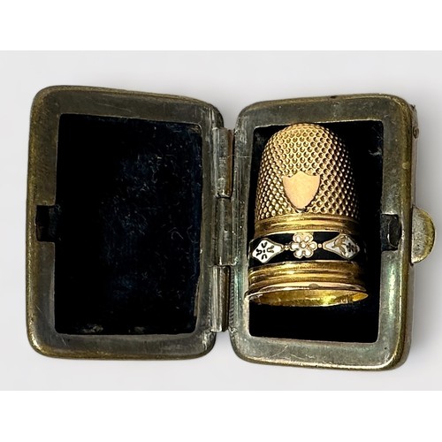 402 - a French 19ct gold thimble, with typical dimpled crown and skirt, vacant cartouche, the frieze with ... 