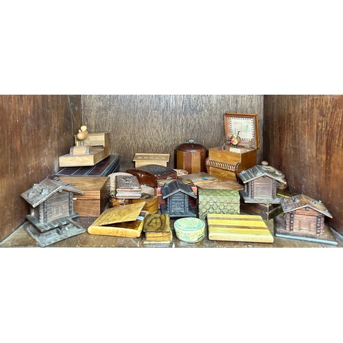 514 - A collection  of wooden cigarette dispensers and boxes, carved, painted and marquetry examples (In S... 