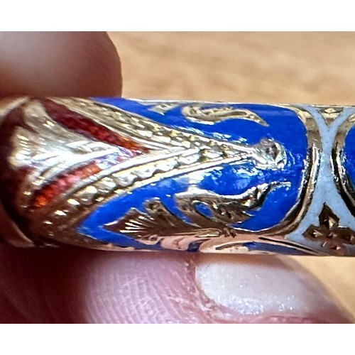 264 - A gold and enamelled propelling pencil by Sampson Mordan & Co. The outer sleeve blue, red and white ... 