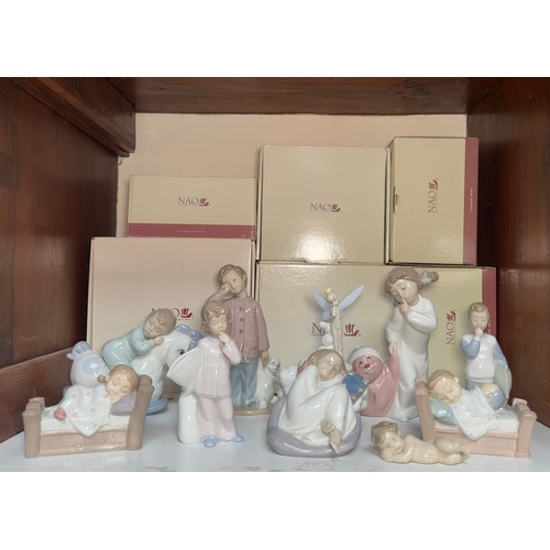 11 - Nine various NAO sleepy or sleeping porcelain figures, five boxed, including ‘Dreaming of Tinker Bel... 