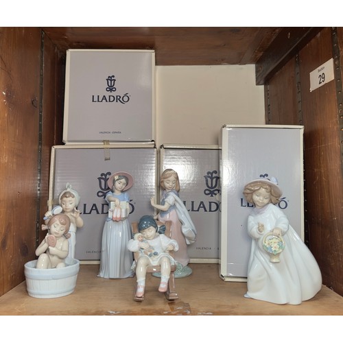 18 - Four various boxed Lladro porcelain figures, comprising, Happiness, 06685, Bathing Beauties, 06457, ... 