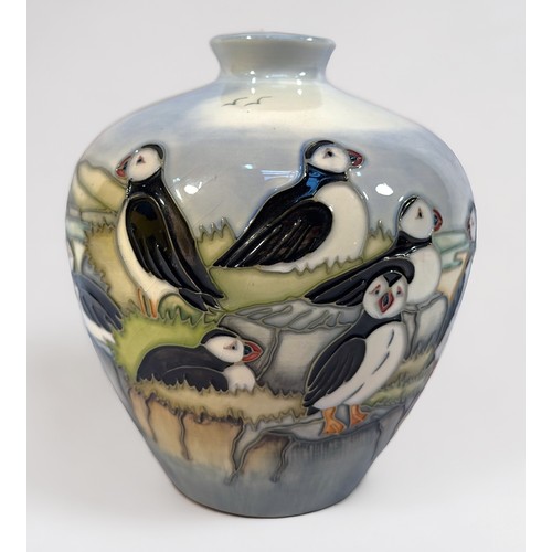 20 - A Moorcroft Pottery vase in the ‘Puffin’ design, of ovoid form, with small flared rim (chip to rim) ... 