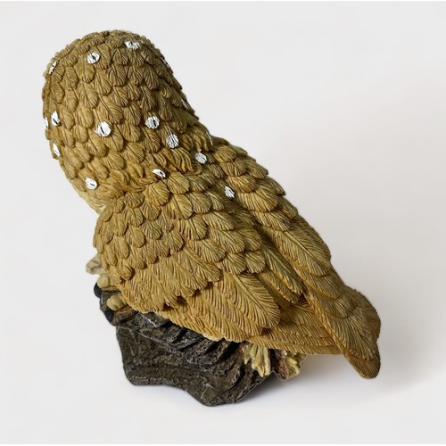 1 - A hand-painted composite moulded figure of a Tawny owl, 30cm high