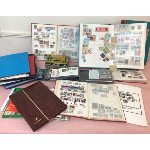 312 - A collection of GB and world stamps, used and unused, housed across ten stock books and binders, inc... 