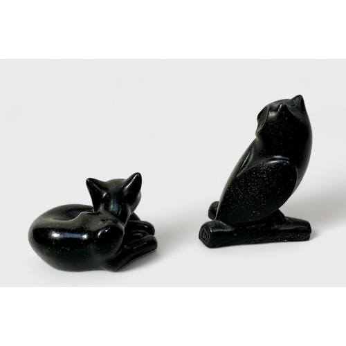 322 - A carved and polished Shungite figure a fox, signed 'J. Picorini,' 5cm wide, together with another o... 