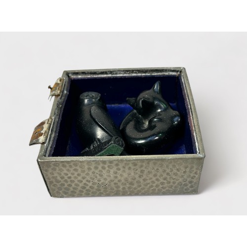 322 - A carved and polished Shungite figure a fox, signed 'J. Picorini,' 5cm wide, together with another o... 