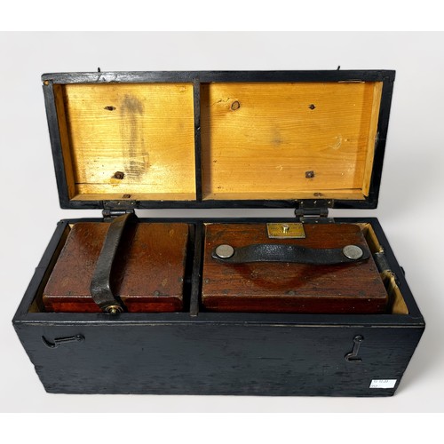 488 - Two early 20th Century cased electrical instruments with leather carry handles by Evershed & Vignole... 