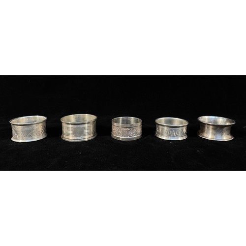 79 - A collection of twenty various silver napkin rings, gross weight approximately 12.05ozt