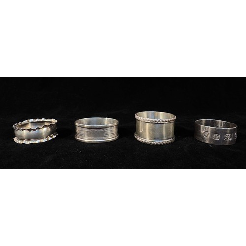 79 - A collection of twenty various silver napkin rings, gross weight approximately 12.05ozt