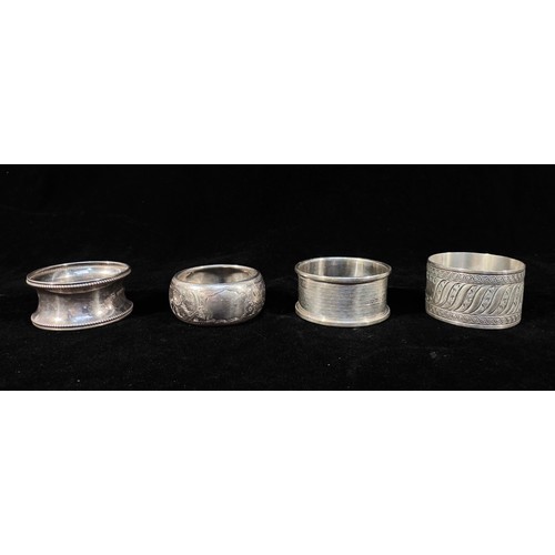 83 - A collection of 20 assorted silver napkin rings, gross weight approximately 11.8ozt