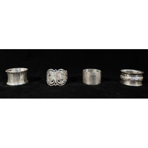 84 - A collection of 20 assorted silver napkin rings, gross weight approximately 10ozt